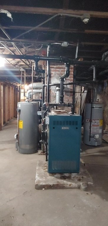 20 Wabash Avenue Worcester, MA 01604 - Photo 23 of 26 a utility room with a wooden floor