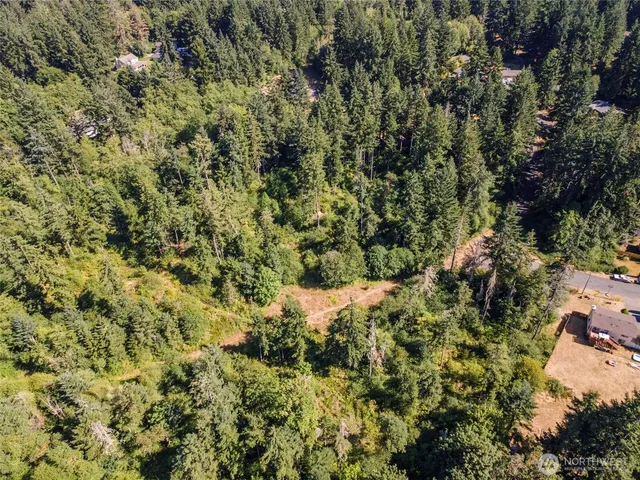 a view of a and covered with green field