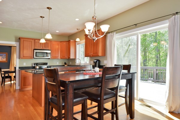7 John Riley Road Ayer, MA 01432 - Photo 9 of 29 a view of a dining room with furniture window and wooden floor