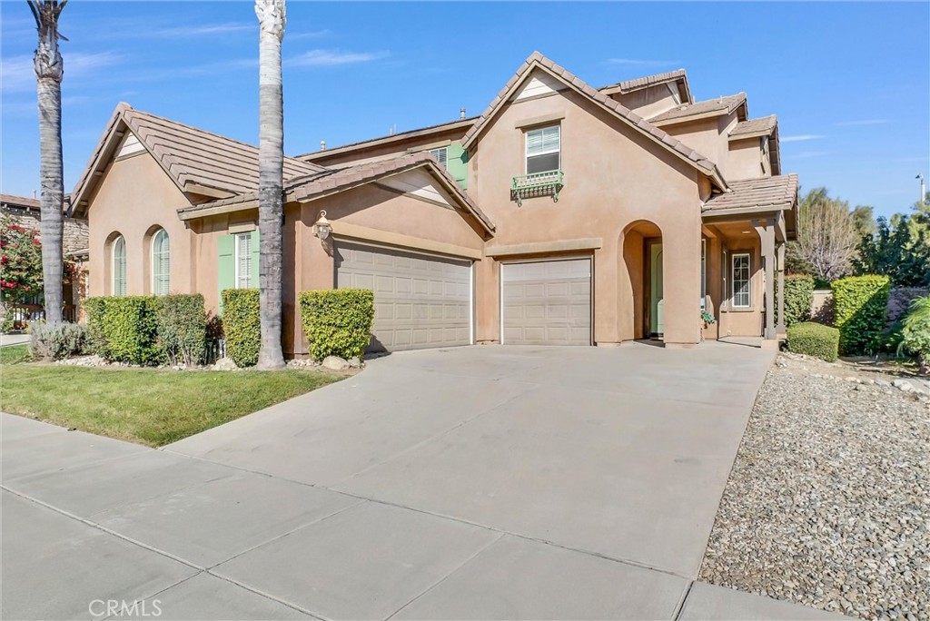 7595 Duck Creek Place Rancho Cucamonga, CA 91739 - Photo 1 of 1 a view of a house with a yard