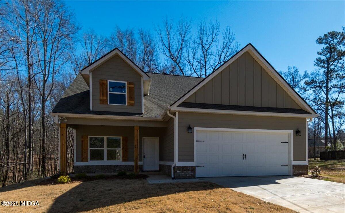 372 Walnut Grove Road Gray, GA 31032 - Photo 1 of 21 a front view of a house with garden