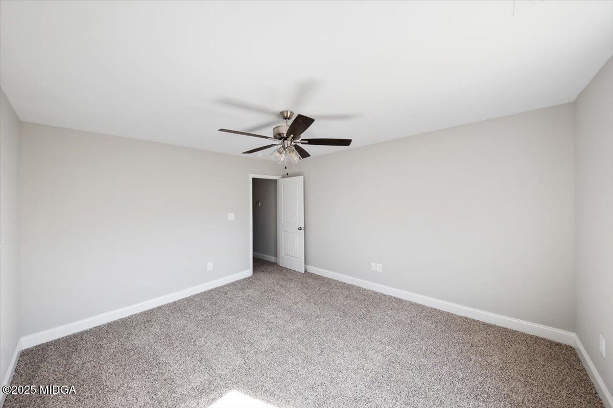 372 Walnut Grove Road Gray, GA 31032 - Photo 15 of 21 a view of a room with a fan