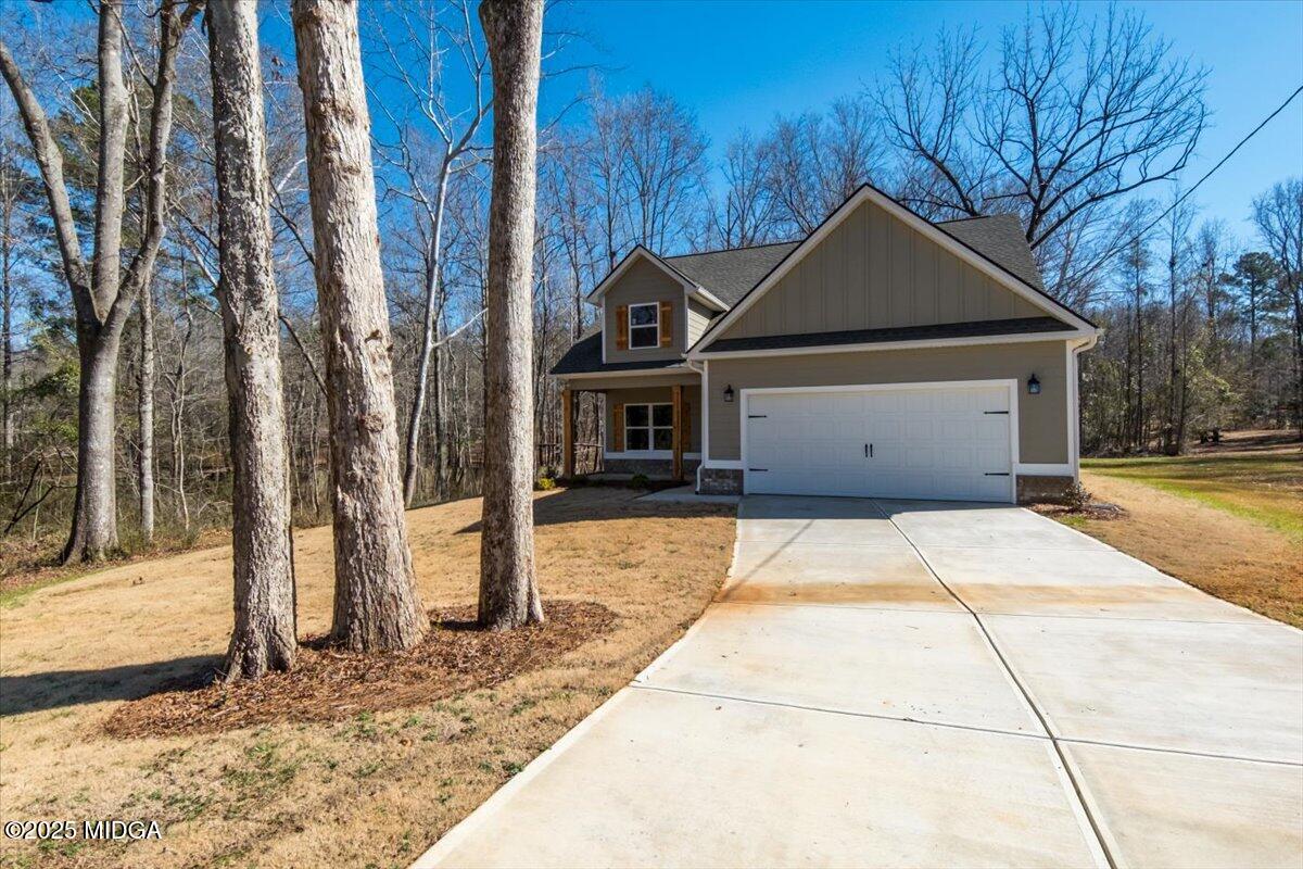 372 Walnut Grove Road Gray, GA 31032 - Photo 2 of 21 a front view of a house with a yard