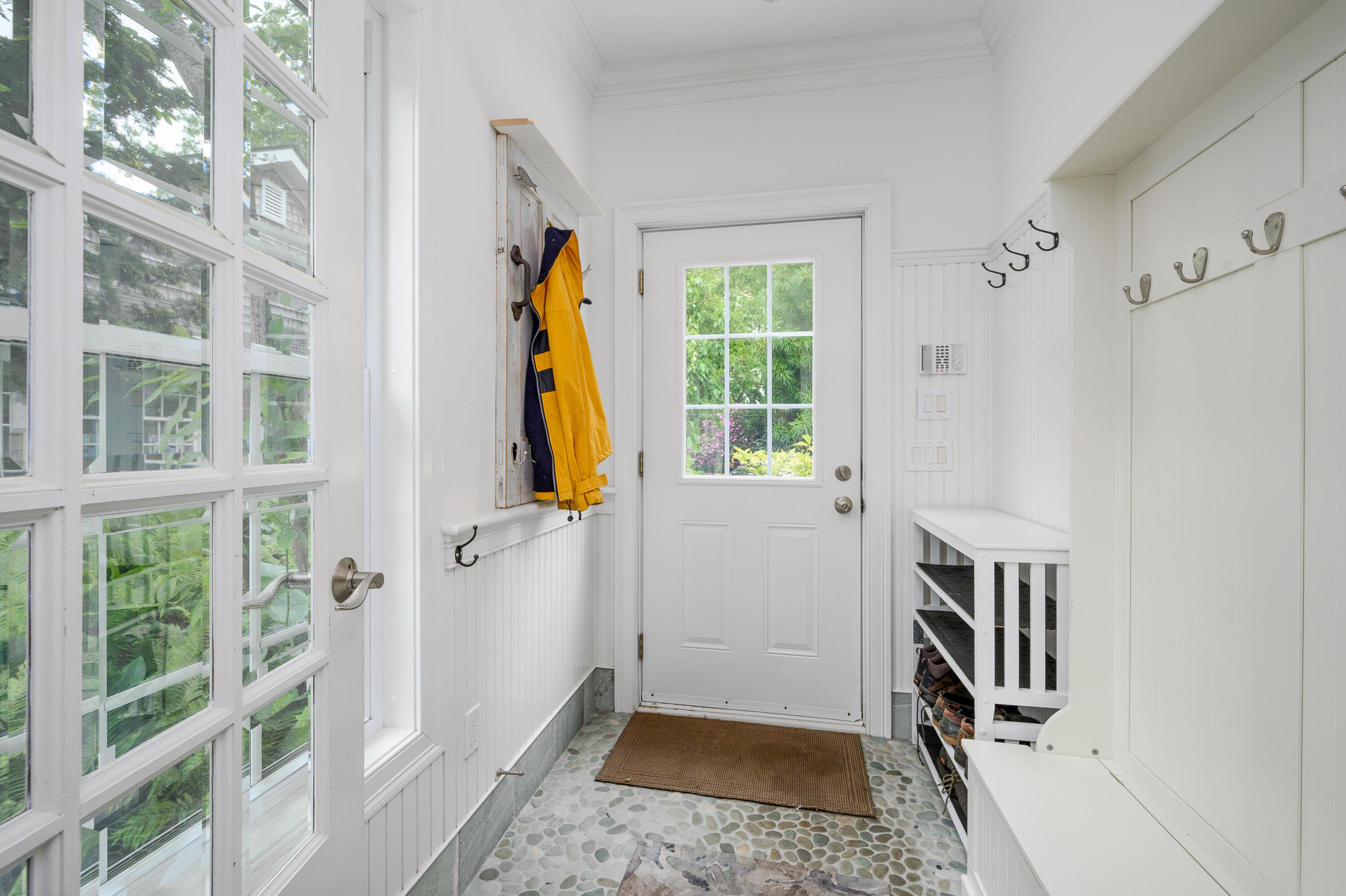 256 Pleasant Bay Road Harwich, MA 02645 - Photo 11 of 71 a view of a hallway with windows and closet