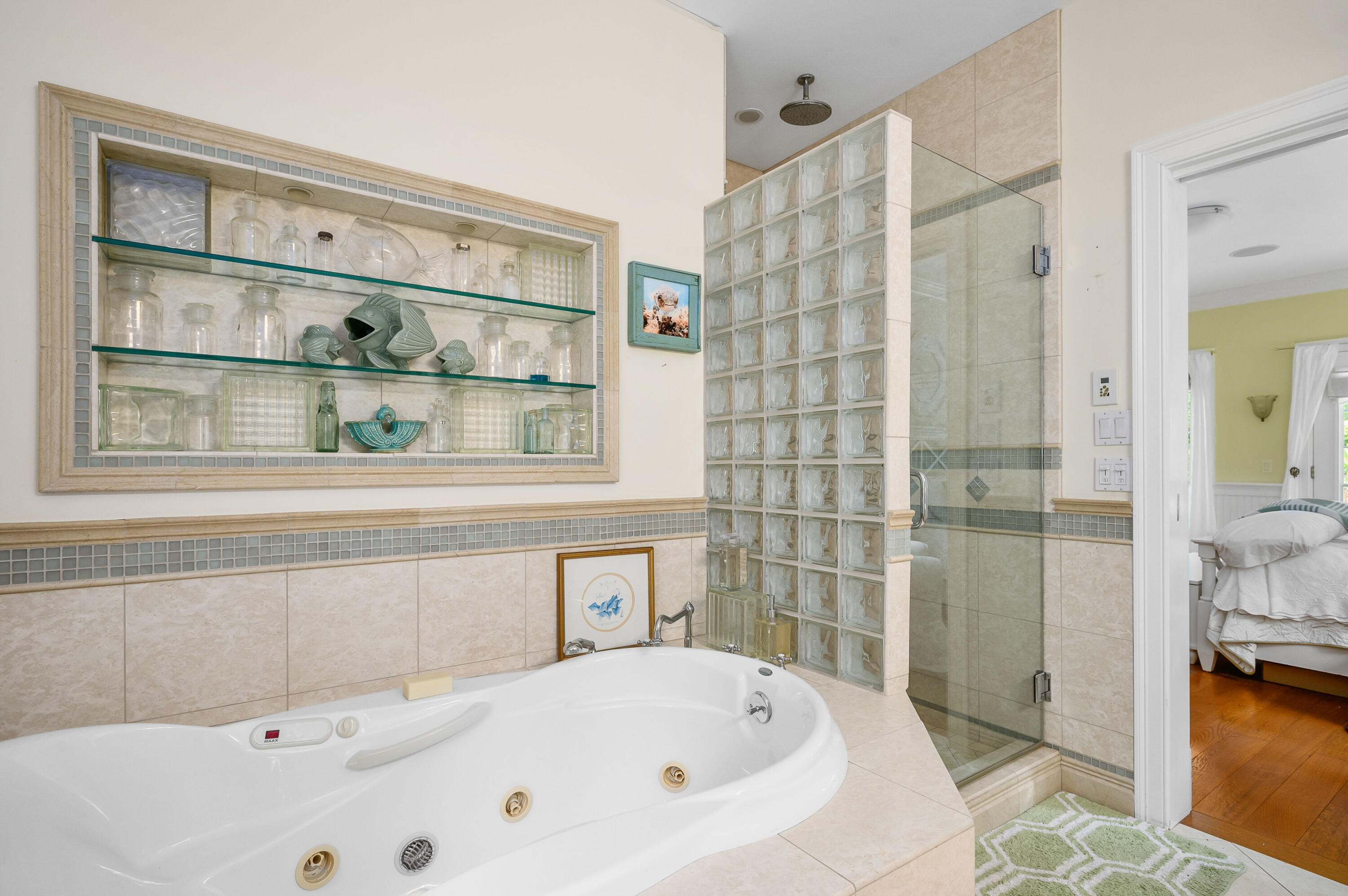 256 Pleasant Bay Road Harwich, MA 02645 - Photo 23 of 71 a bathroom with bathtub and shower