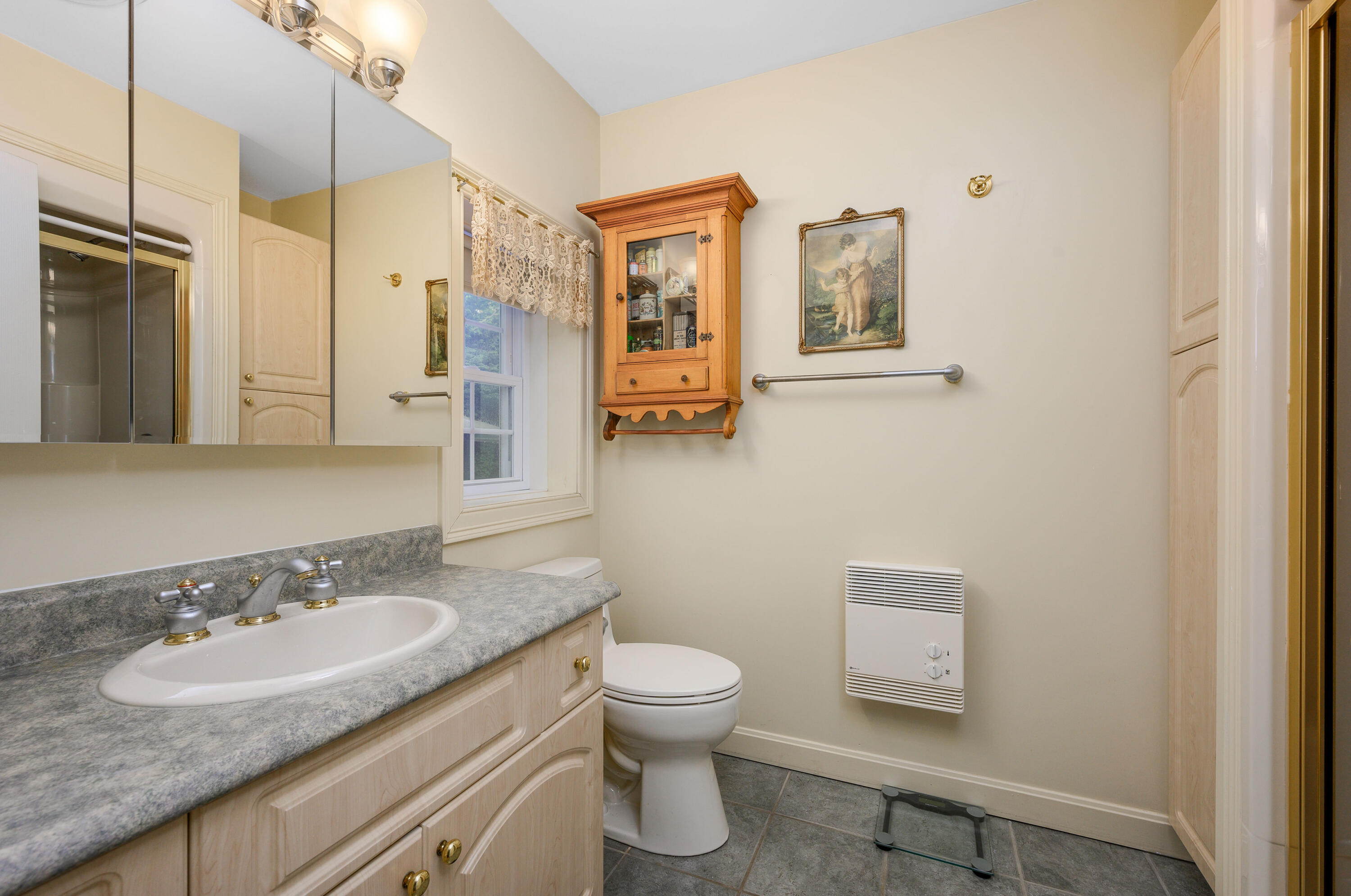 256 Pleasant Bay Road Harwich, MA 02645 - Photo 30 of 71 a bathroom with a granite countertop sink toilet and shower