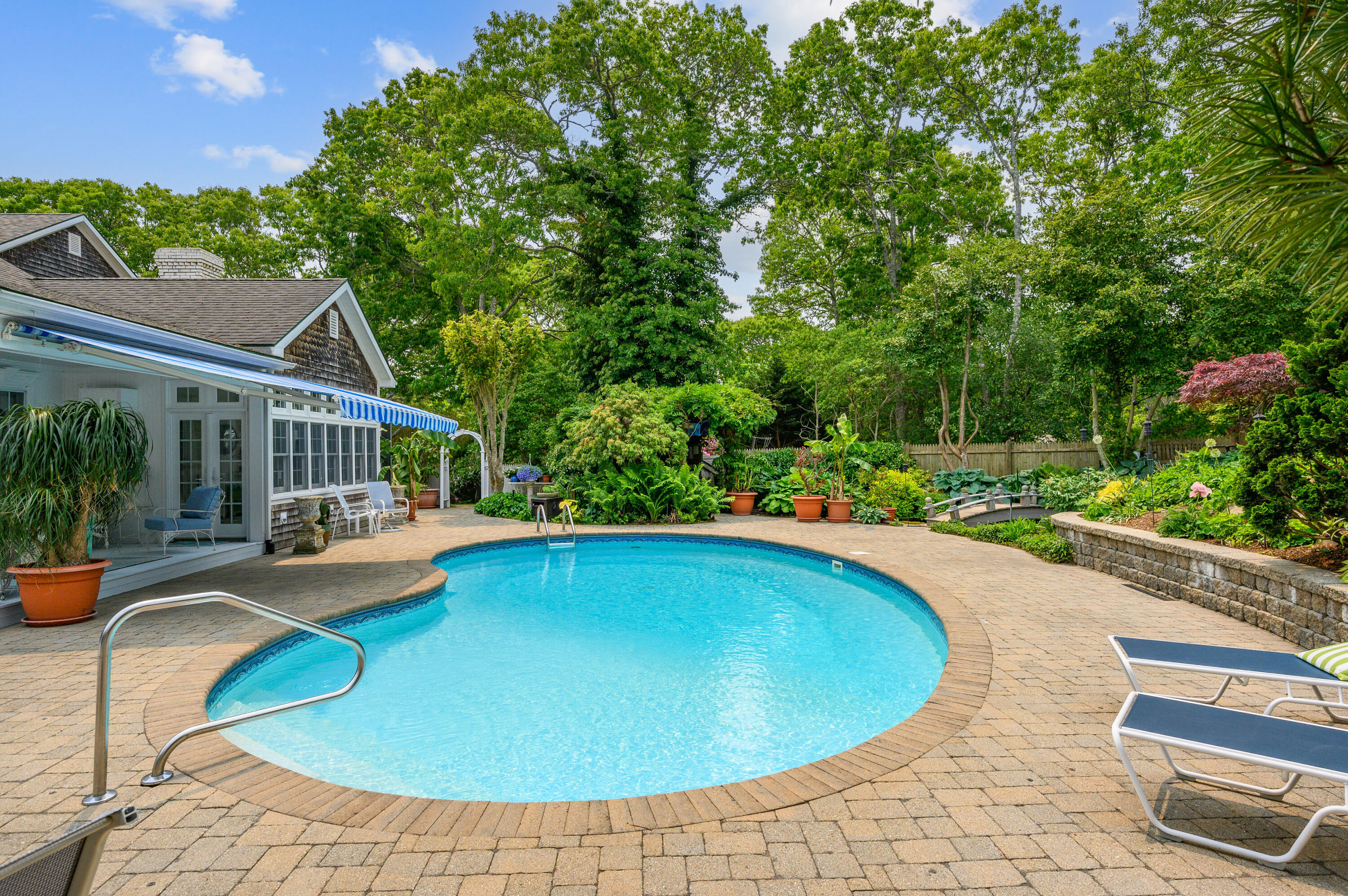 256 Pleasant Bay Road Harwich, MA 02645 - Photo 39 of 71 a view of swimming pool with seating space