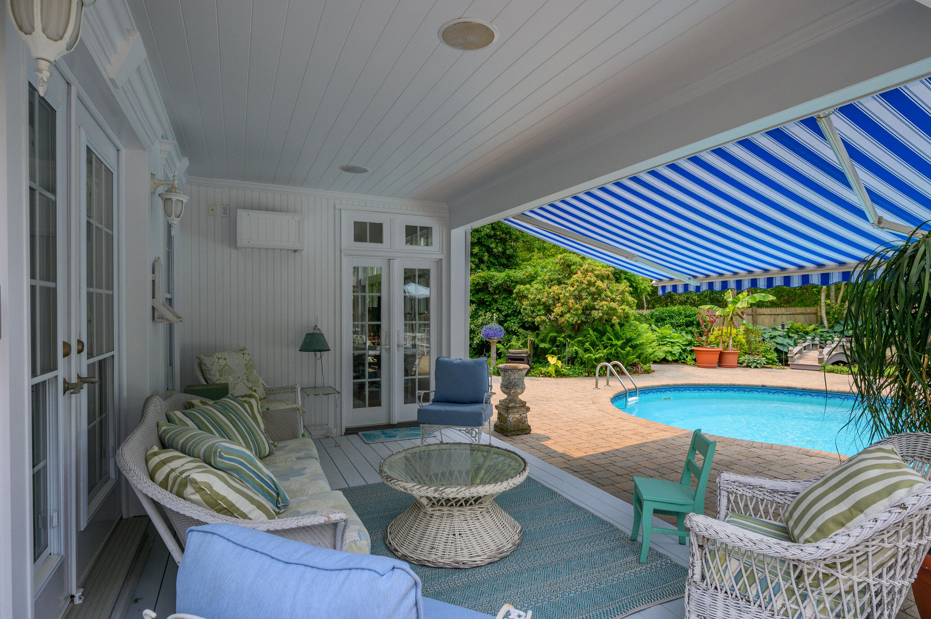 256 Pleasant Bay Road Harwich, MA 02645 - Photo 40 of 71 a living room with furniture and a large window