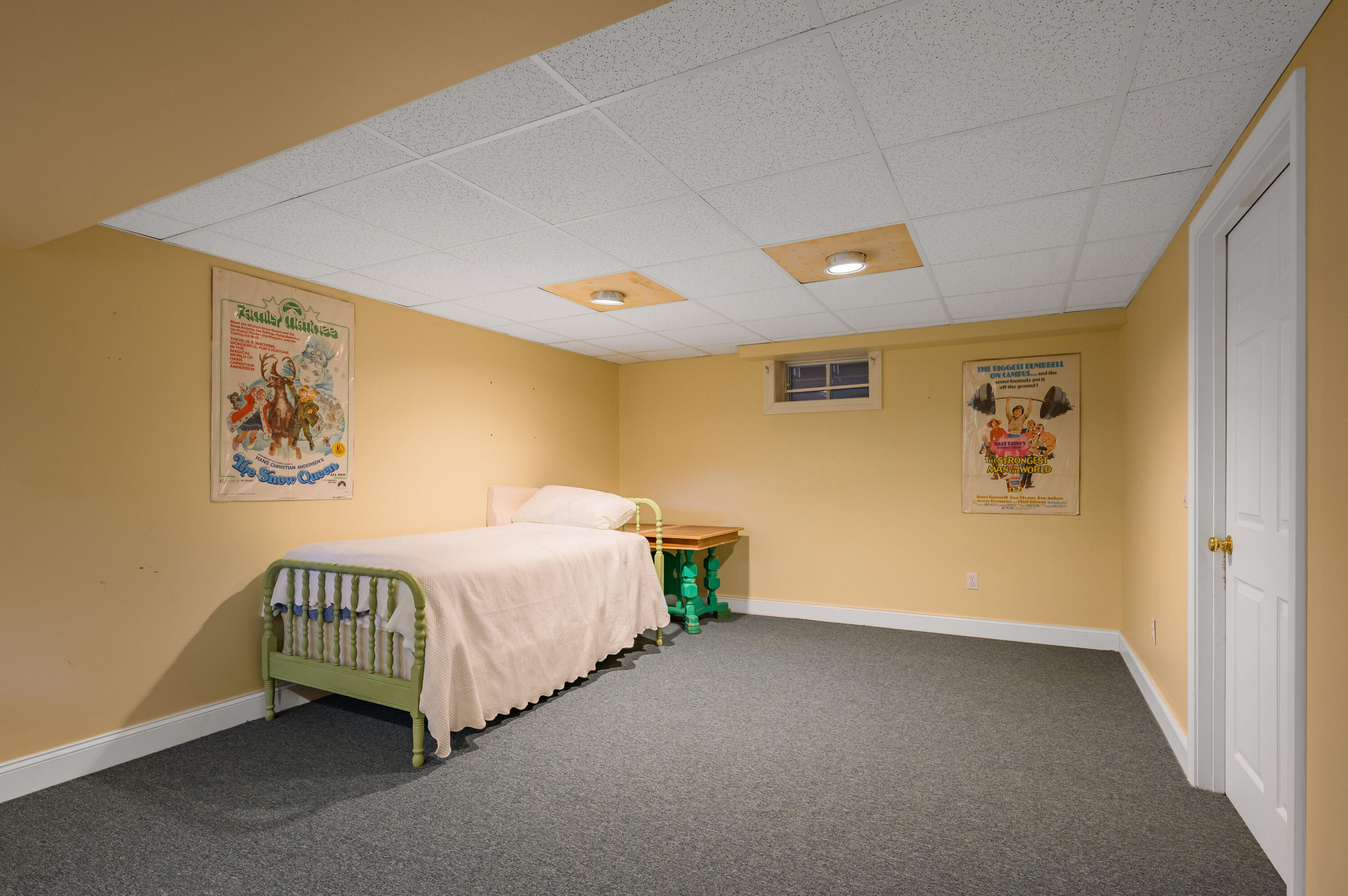 256 Pleasant Bay Road Harwich, MA 02645 - Photo 52 of 71 a spacious bedroom with a bed and a wall painting