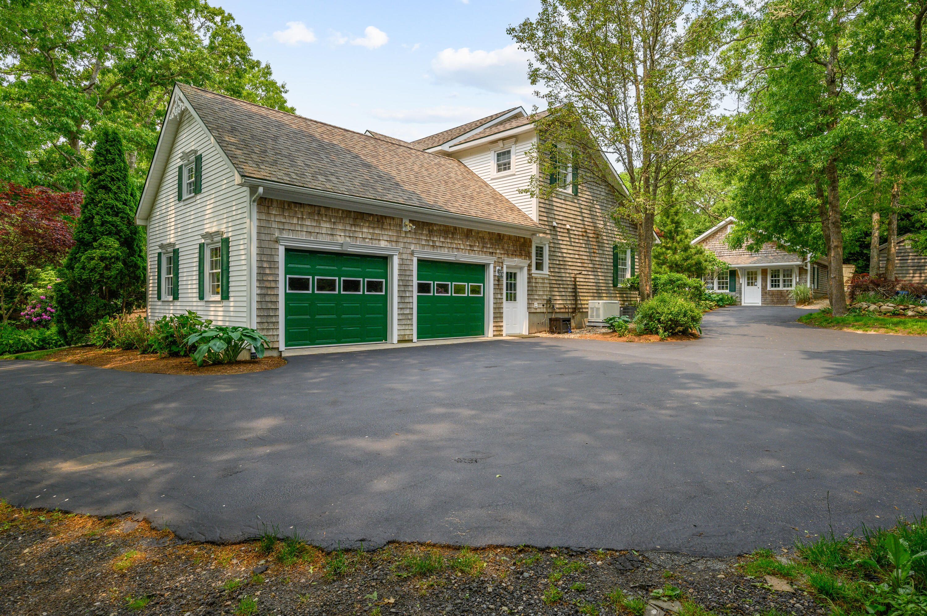 256 Pleasant Bay Road Harwich, MA 02645 - Photo 60 of 71 a view of a house with a street
