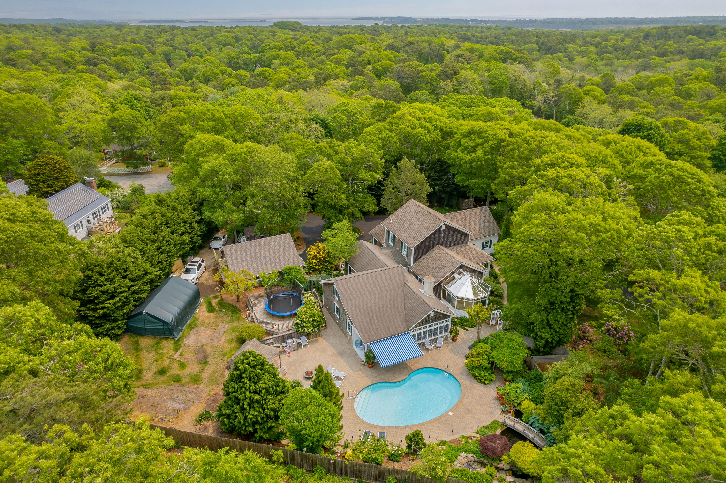 256 Pleasant Bay Road Harwich, MA 02645 - Photo 61 of 71 an aerial view of residential houses with outdoor space and street view