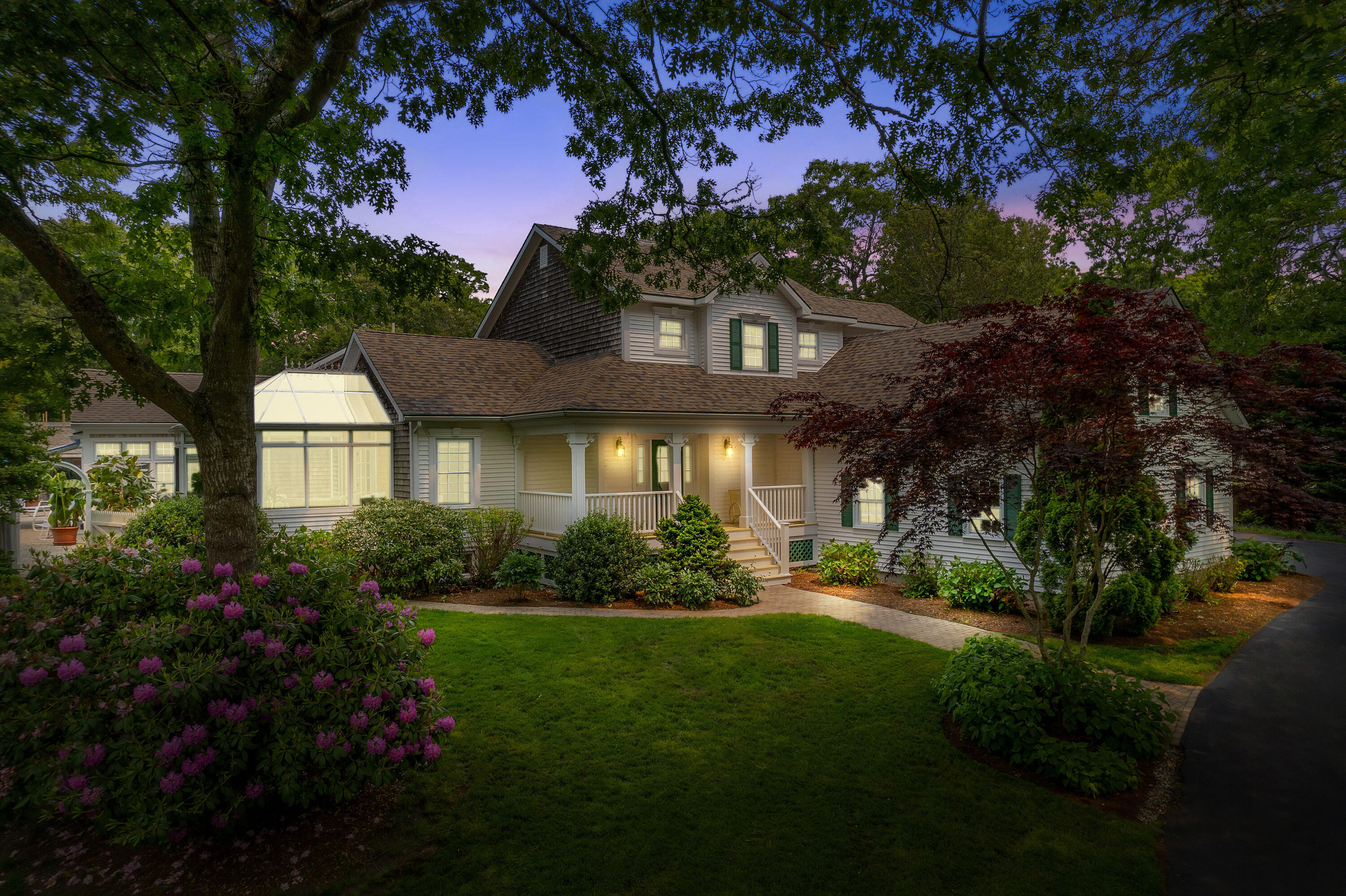 256 Pleasant Bay Road Harwich, MA 02645 - Photo 67 of 71 a front view of a house with a yard