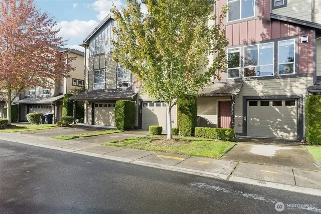 a view of a living room with a wooden floor