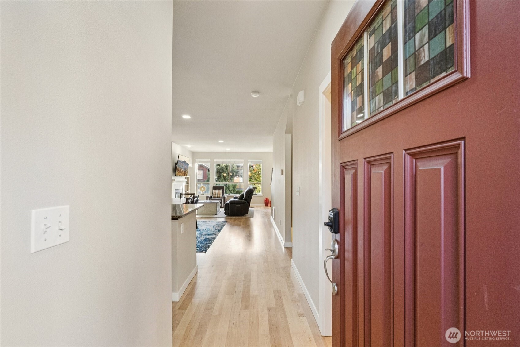 16408 2nd Avenue Southeast Bothell, WA 98012 - Photo 2 of 27 a view of a living room with a wooden floor