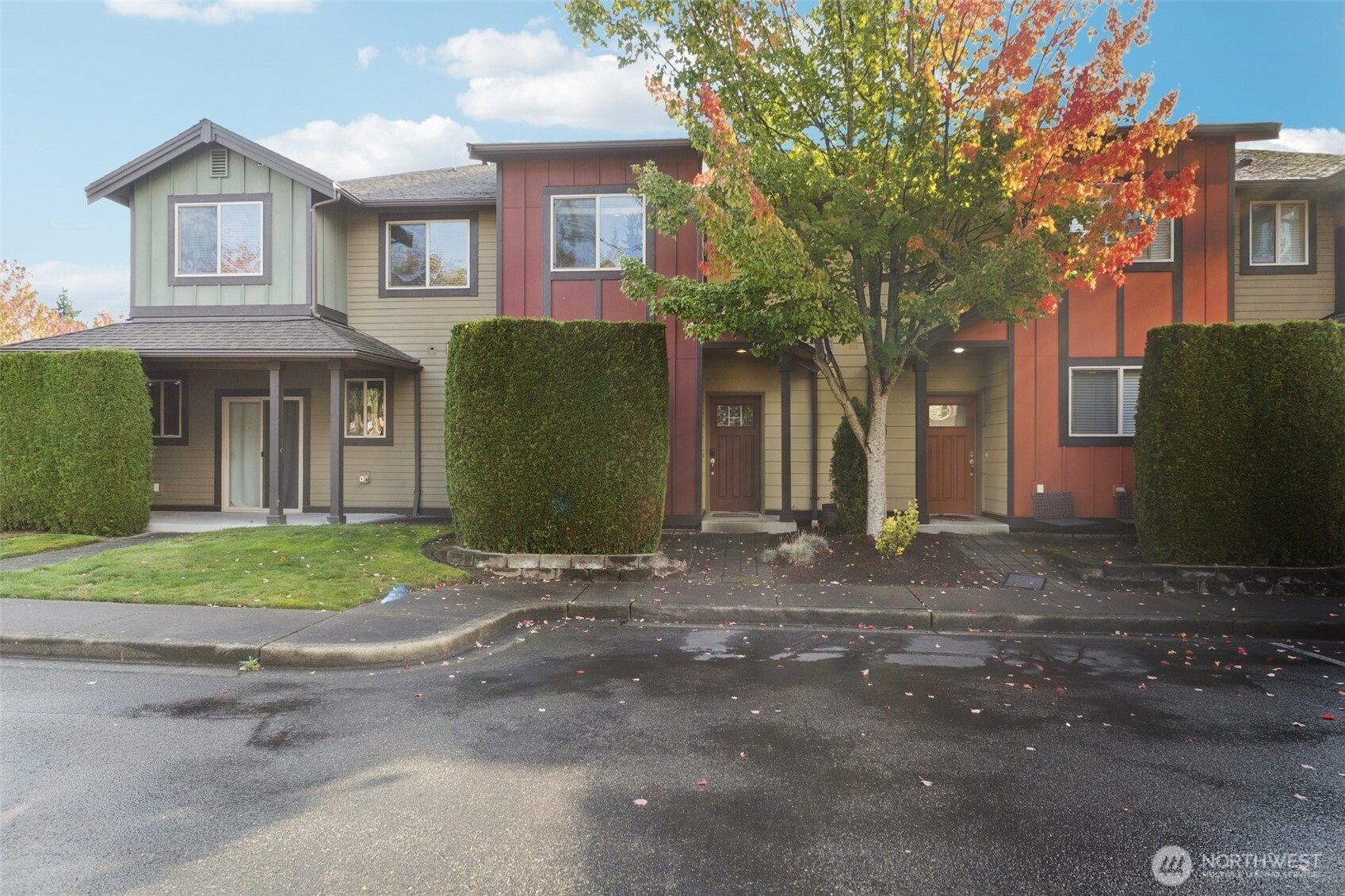 16408 2nd Avenue Southeast Bothell, WA 98012 - Photo 23 of 27 a front view of a house with a garden and plants