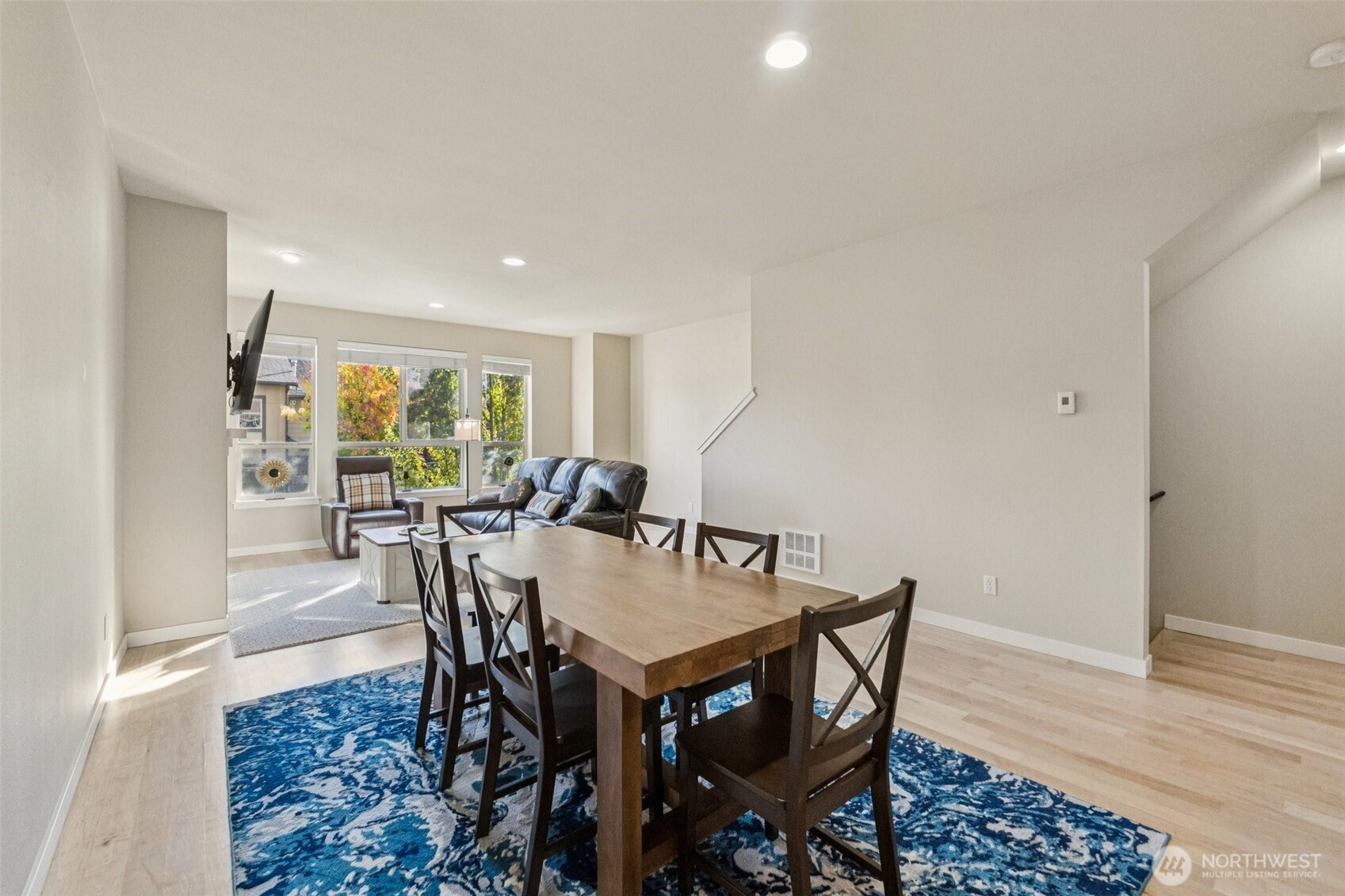 16408 2nd Avenue Southeast Bothell, WA 98012 - Photo 9 of 27 a view of a dining room with furniture and wooden floor