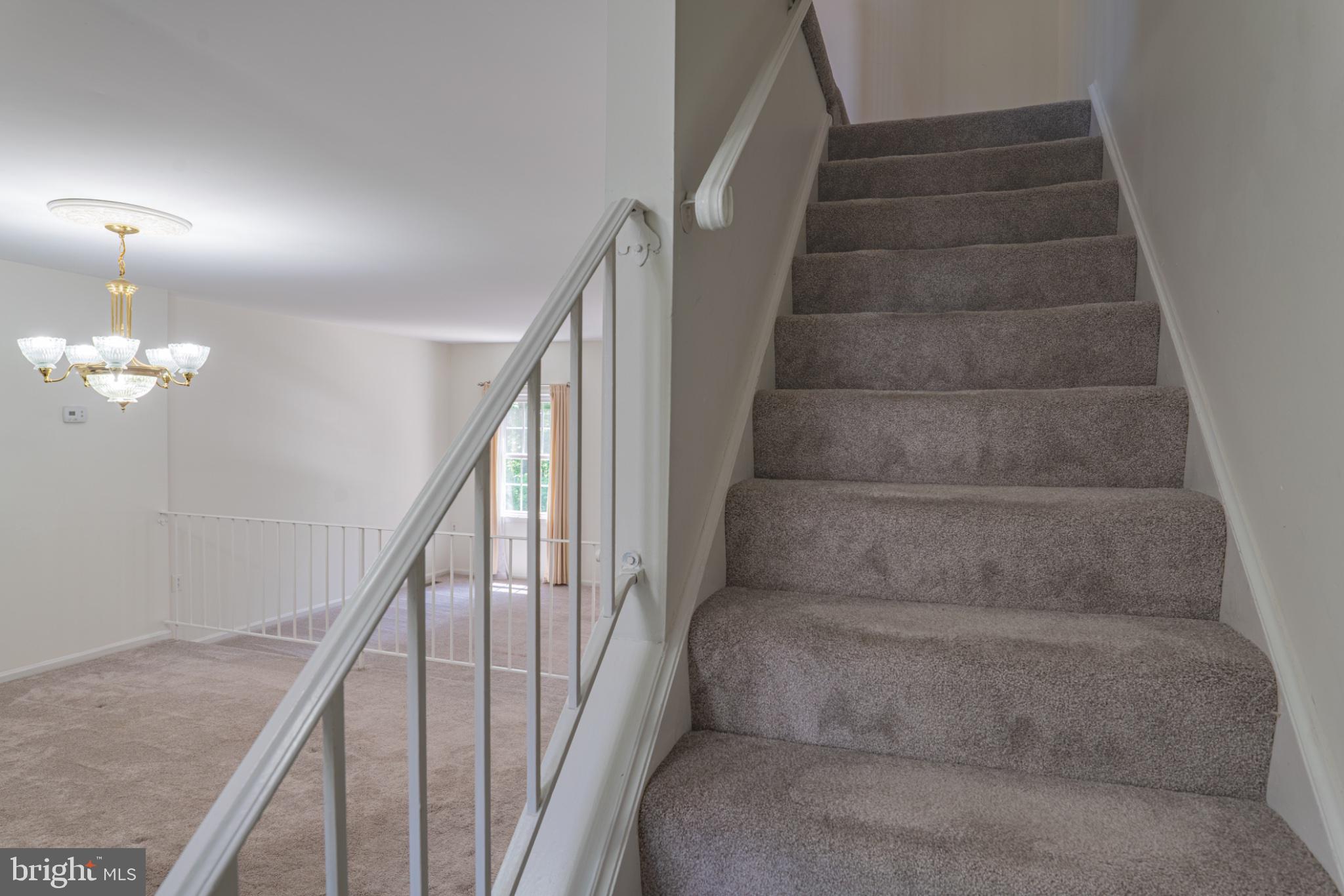 2913 Seminole Road Woodbridge, VA 22192 - Photo 21 of 34 a view of staircase with white walls and stairs