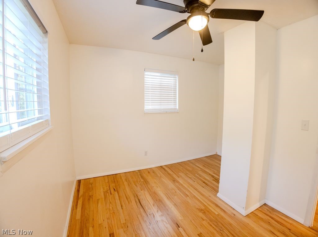 8828 Edgehill Road Mentor, OH 44060 - Photo 17 of 24 Empty room featuring plenty of natural light, light hardwood / wood-style floors, and ceiling fan