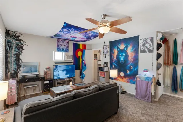 a room with furniture and window