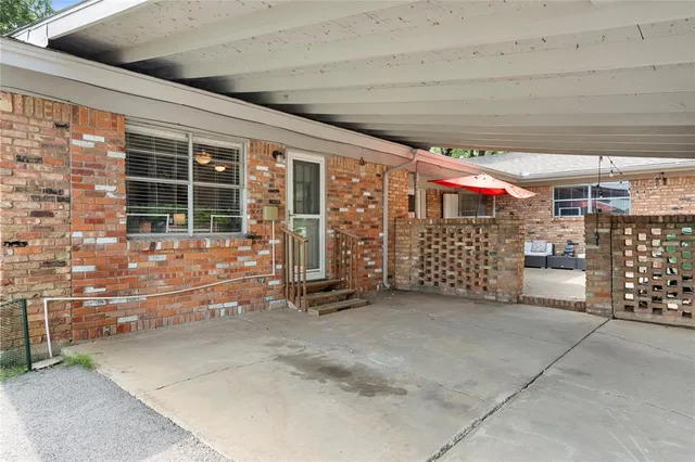 a view of a house with a street