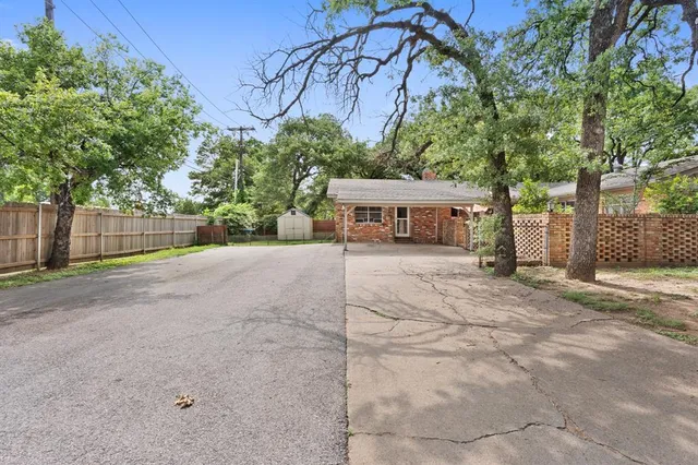 a view of lake with green space