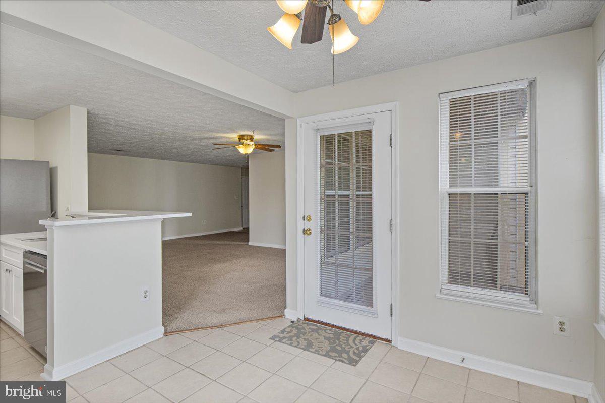 2445 Blue Spring Court, Unit 103 Odenton, MD 21113 - Photo 16 of 31 en view interior of the house and window