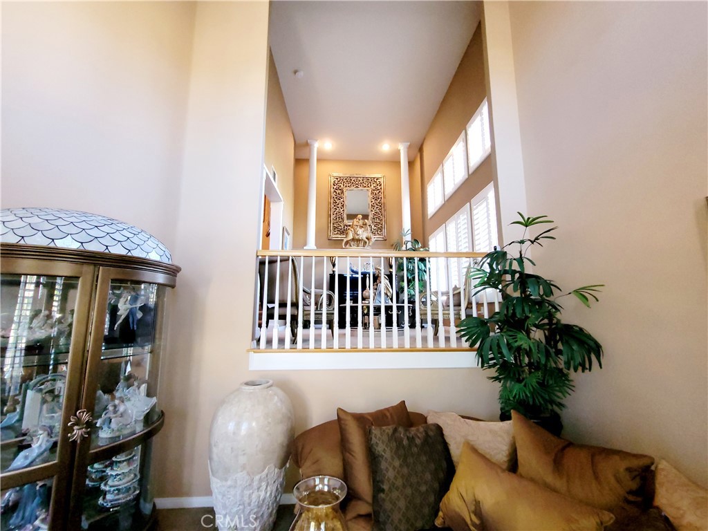 14119 Ashton Lane Riverside, CA 92508 - Photo 14 of 47 a living room with furniture and a potted plant