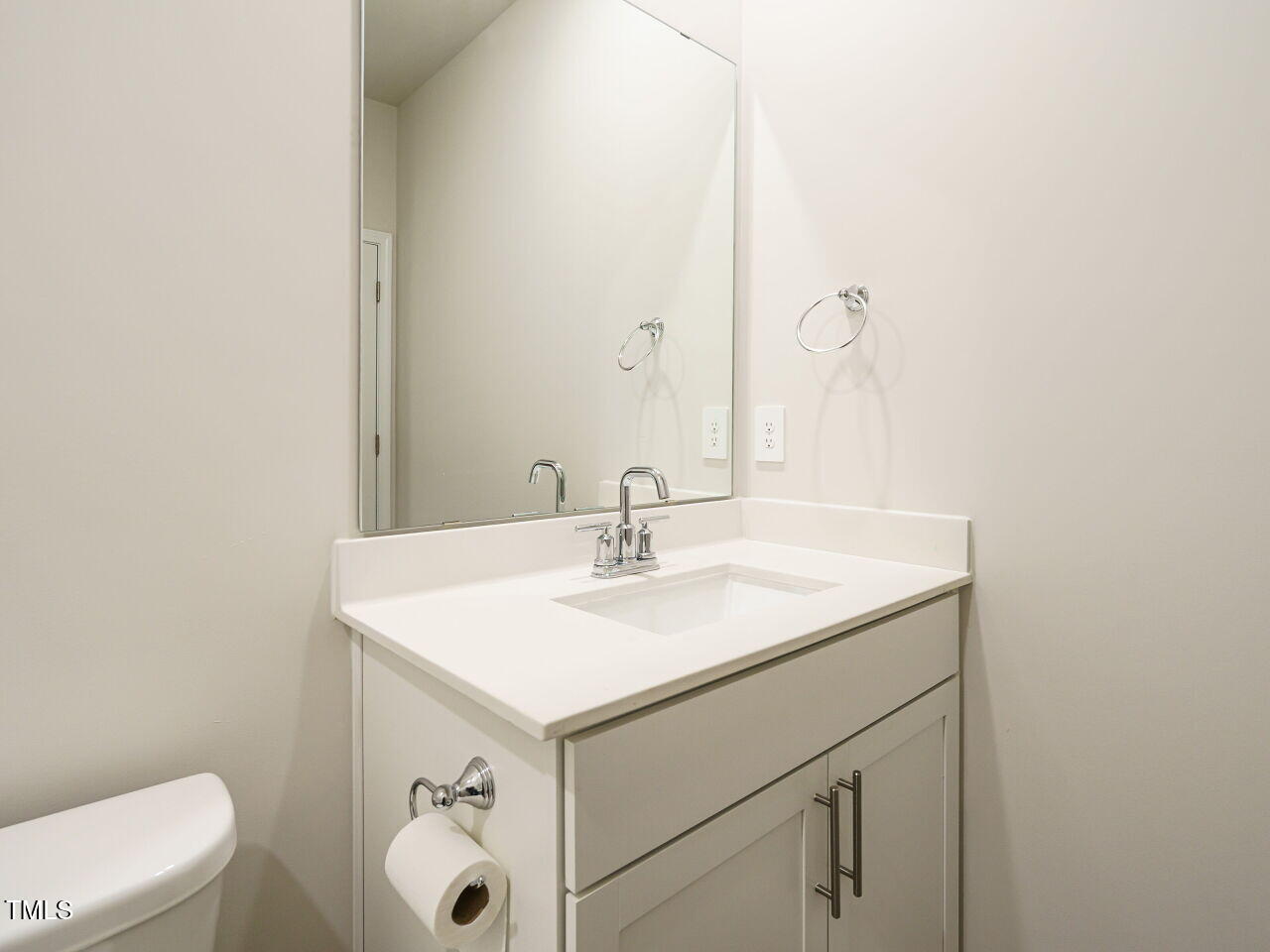 792 Riguard Way Wendell, NC 27591 - Photo 21 of 46 a bathroom with a sink a toilet and a mirror