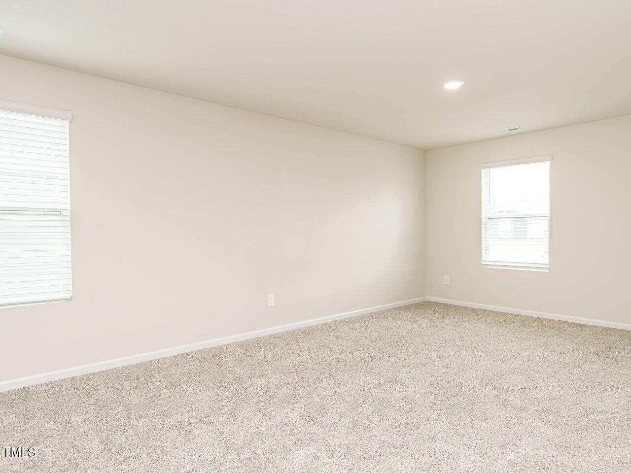 792 Riguard Way Wendell, NC 27591 - Photo 23 of 46 an empty room with a window