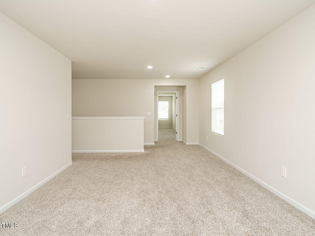 792 Riguard Way Wendell, NC 27591 - Photo 25 of 46 a view of an empty room with a window