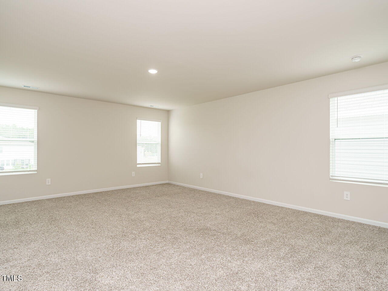 792 Riguard Way Wendell, NC 27591 - Photo 26 of 46 an empty room with a window