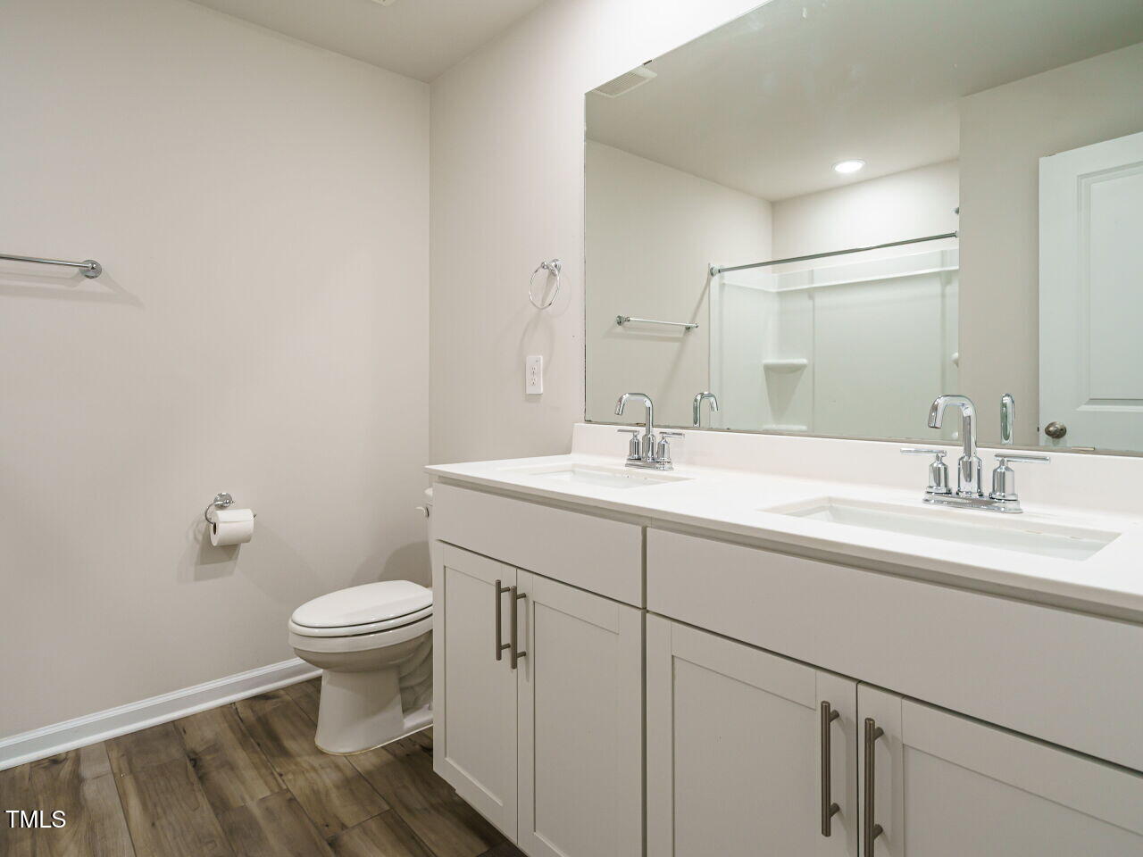 792 Riguard Way Wendell, NC 27591 - Photo 33 of 46 a bathroom with a sink toilet and a mirror