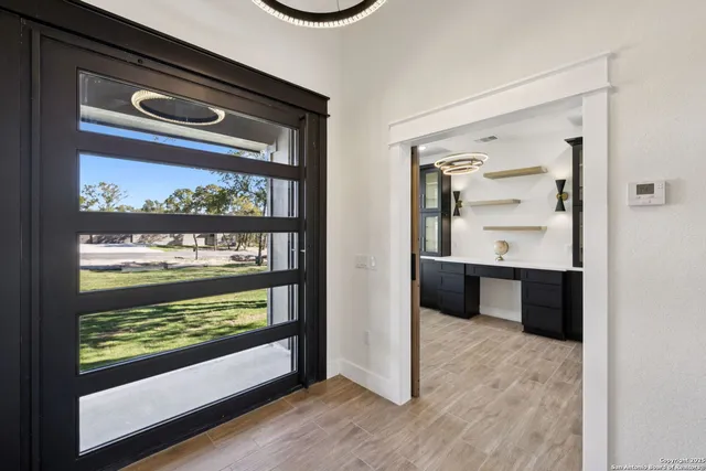a view of a kitchen from a window