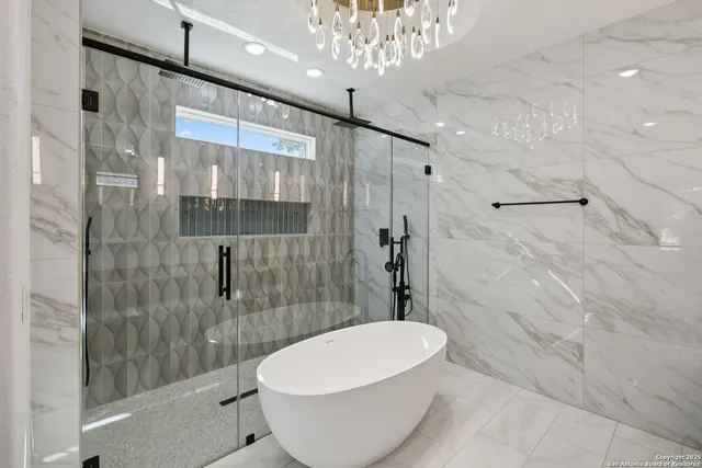 a bathroom with a toilet and shower