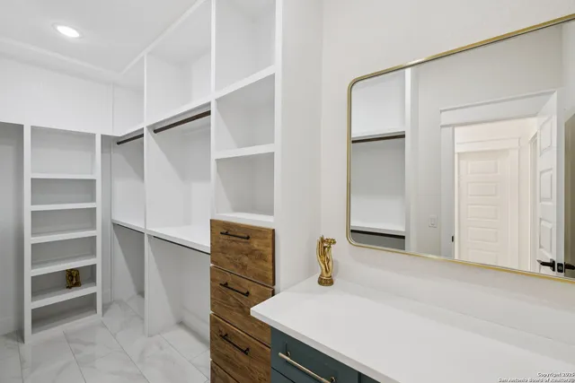 a view of an empty room with empty racks