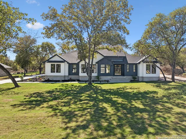 a bathroom with a bathtub and a sink