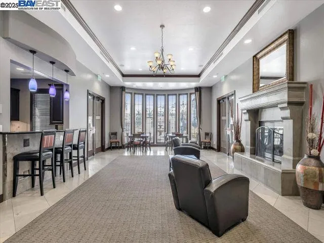 a view of a field with an trees in the background