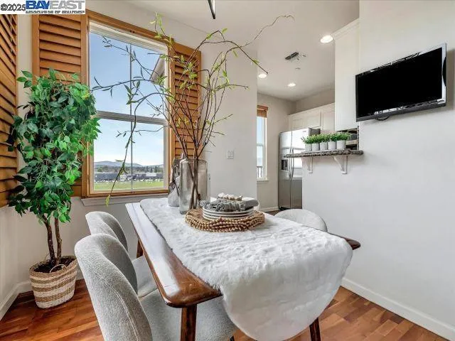 a view of a park with swings and slides