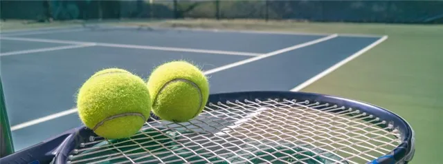 a kitchen with stainless steel appliances granite countertop a sink a stove a microwave a sink and white cabinets