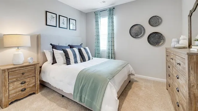 a white toilet sitting next to a bath tub