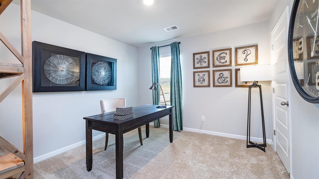 1910 Van Alen Court Dacula, GA 30019 - Photo 61 of 64 a view of a livingroom with furniture and a window