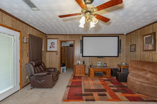 a room with furniture and a rug