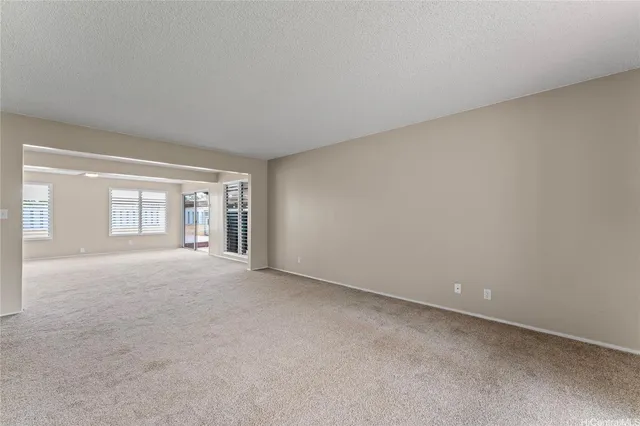 an empty room with a fireplace