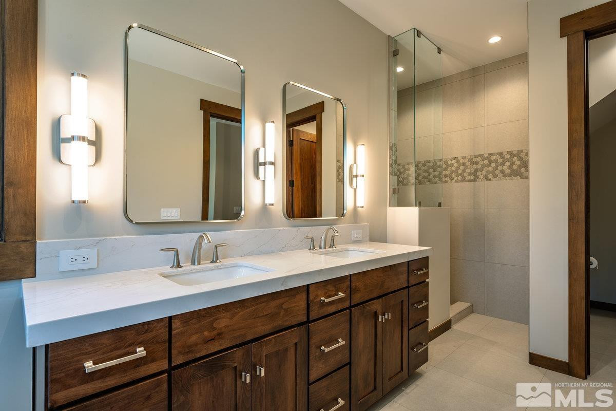 534 Headwaters Way Carson City, NV 89705 - Photo 15 of 39 a bathroom with a double vanity sink mirror and double