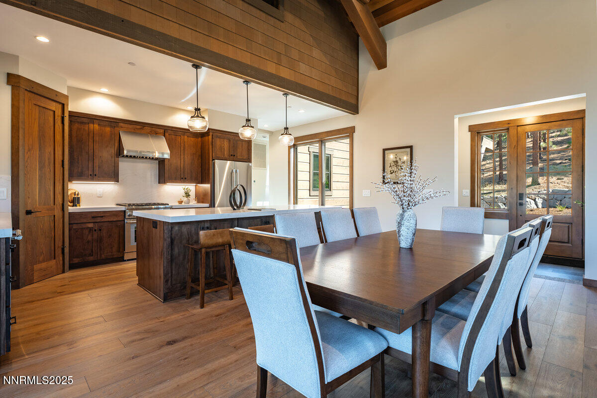 534 Headwaters Way Carson City, NV 89705 - Photo 9 of 39 a view of a dining room with furniture window and wooden floor