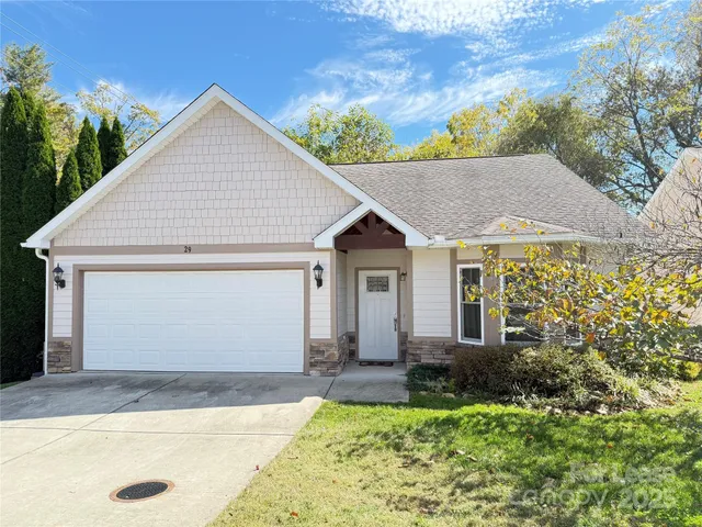 a view of house with garden