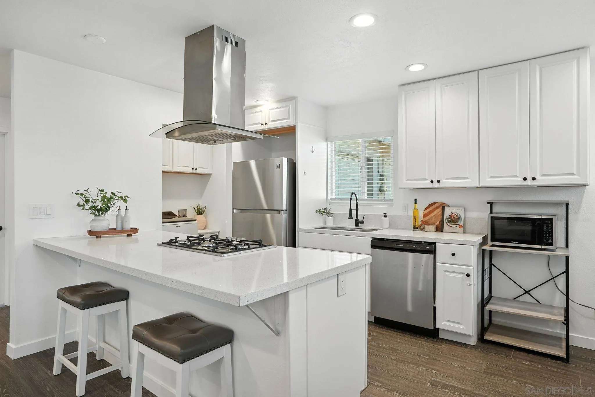 1622 Cherry Place Escondido, CA 92027 - Photo 11 of 27 a kitchen with stainless steel appliances a sink stove and refrigerator