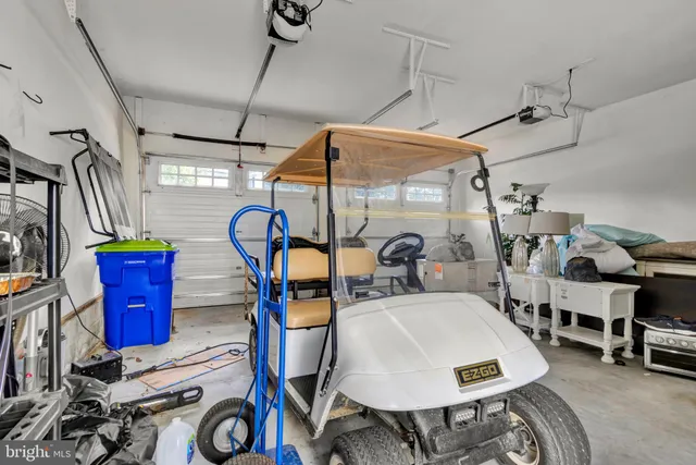 a view of a room that has a table and chairs