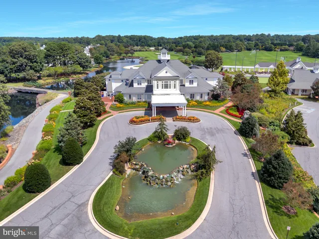 a view of a swimming pool with a lake view