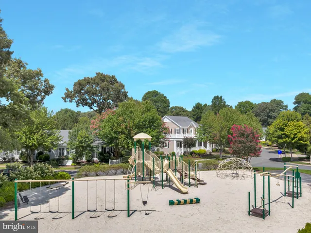 a view of a yard with table and chairs